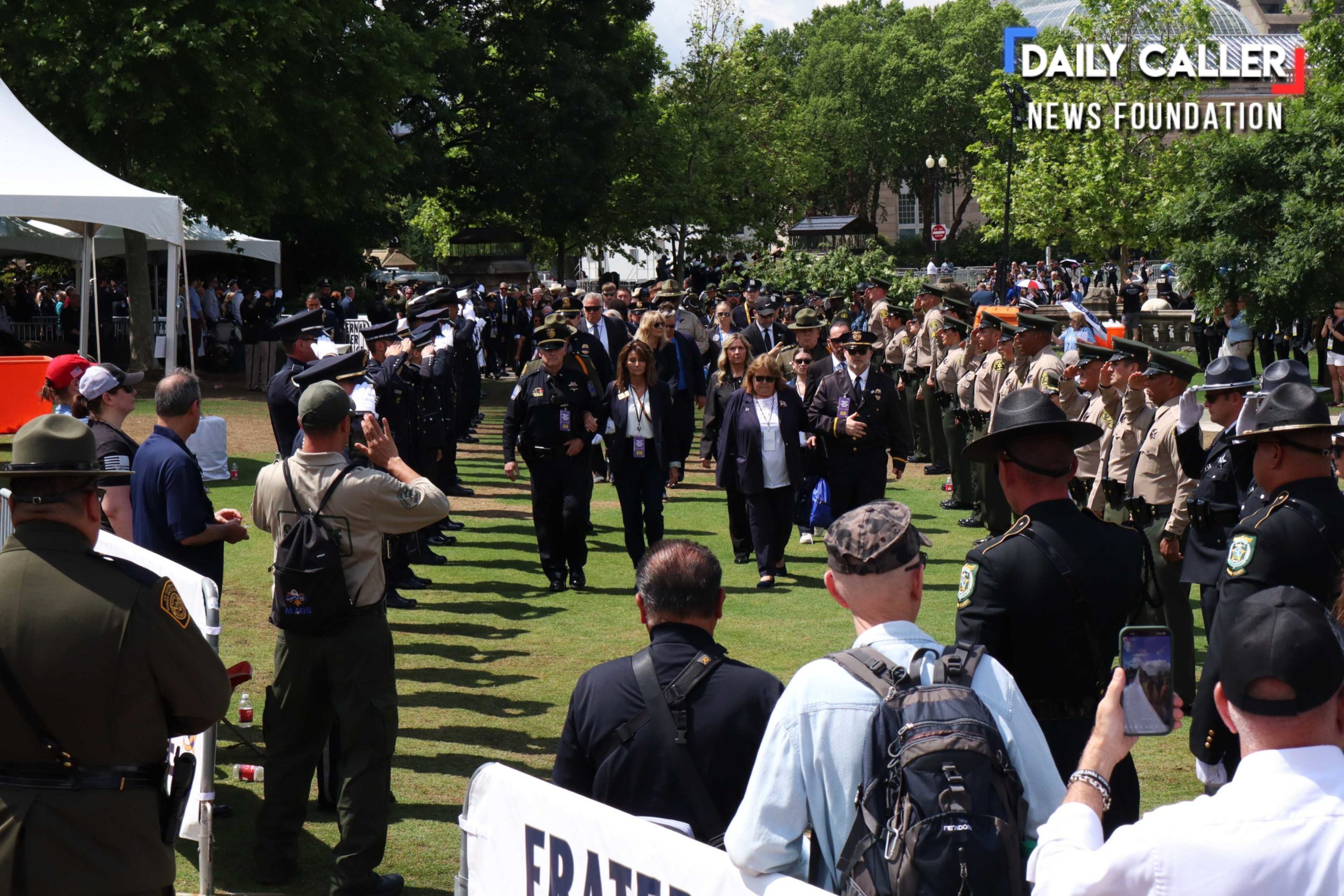 Uniformed "survivors" of the law enforcement profession and their families line up for a welcome at the National Peace Officers' Memorial Service on May 15, 2025 in Washington, D.C.